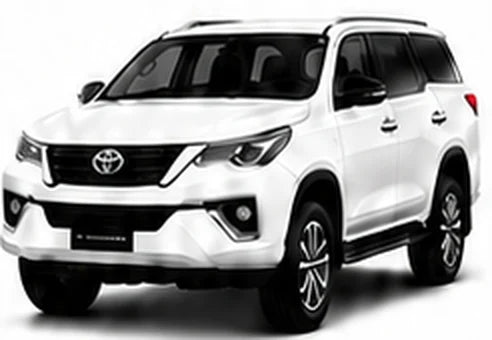 Toyota Fortuner white SUV for underbody coating in Lahore